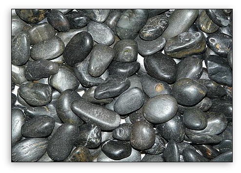 Medium black river stones